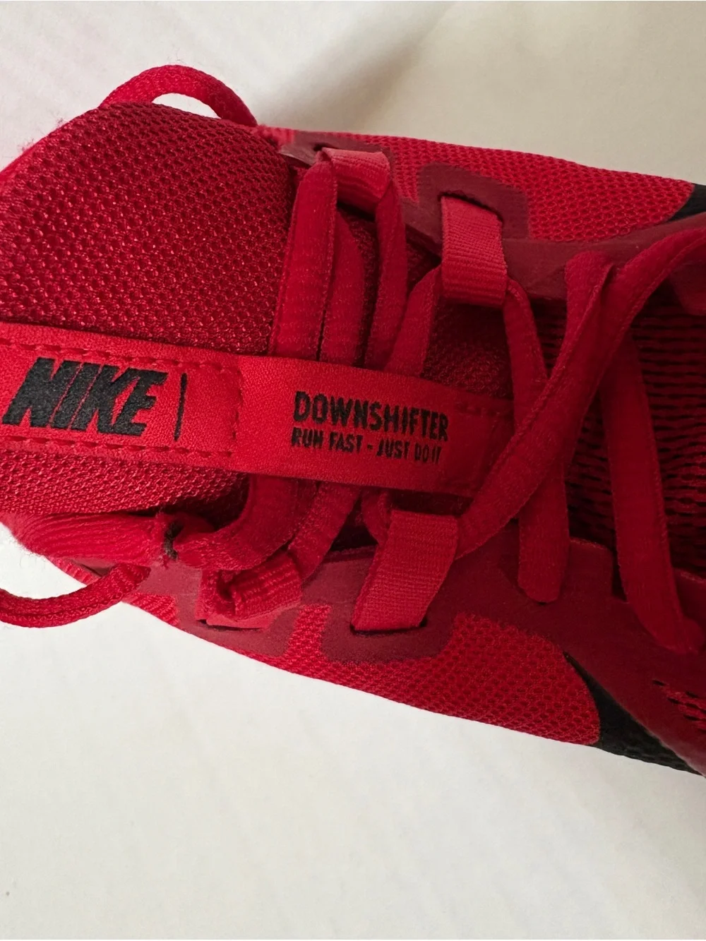 Nike Men’s Red Athletic Running Shoes with Black Swoosh